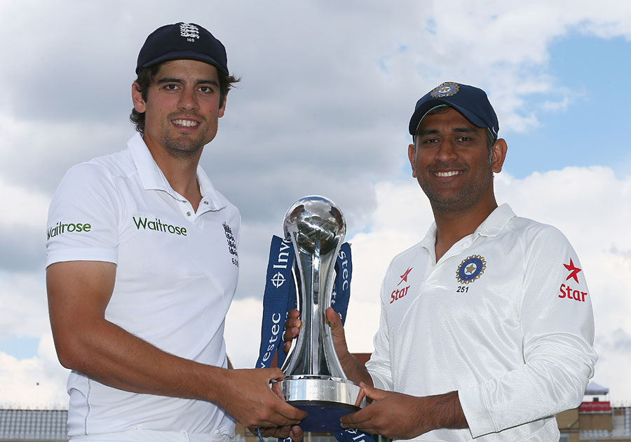 Alastair Cook and MS Dhoni with the series trophy at Trent Bridge on Tuesday.