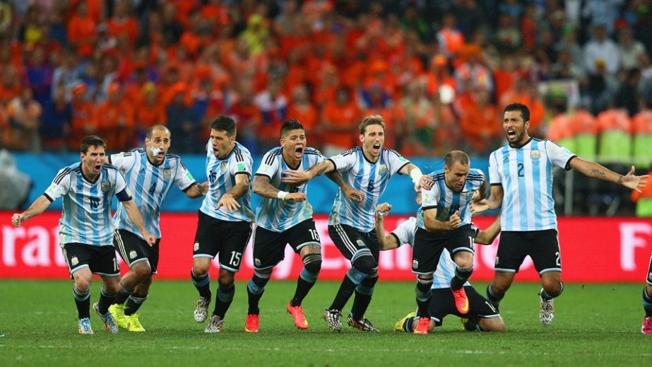 Players of Argentina celebrate defeating the Netherlands in a penalty shootout during the 2014 FIFA World Cup Brazil semi final match between the Netherlands and Argentina at Arena de Sao Paulo in Sao Paulo, Brazil on Wednesday.