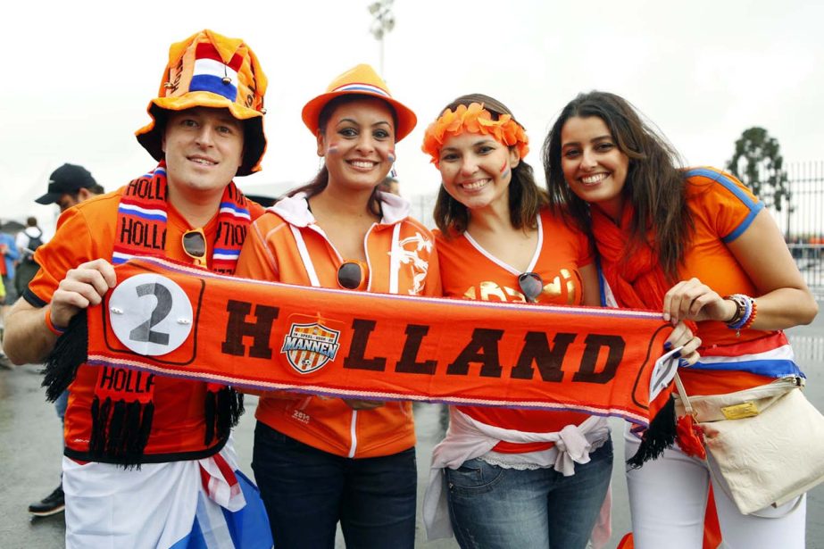 Dutch fans enjoy the atmosphere prior to the 2014 FIFA World Cup Brazil semi final match between the Netherlands and Argentina at Arena de Sao Paulo in Sao Paulo, Brazil on Wednesday.