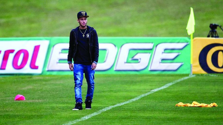 Brazil's forward Neymar arrives at a training session in Teresopolis on Thursday during the FIFA World Cup. Brazil will face Netherlands today in the third place play-off for the FIFA World Cup tournament at The ManÃ© Garrincha National Stadium in Bras