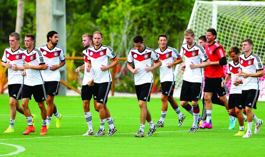 Team members of Germany runs during the German national team training session at Campo Bahia in Santo Andre, Brazil on Thursday.