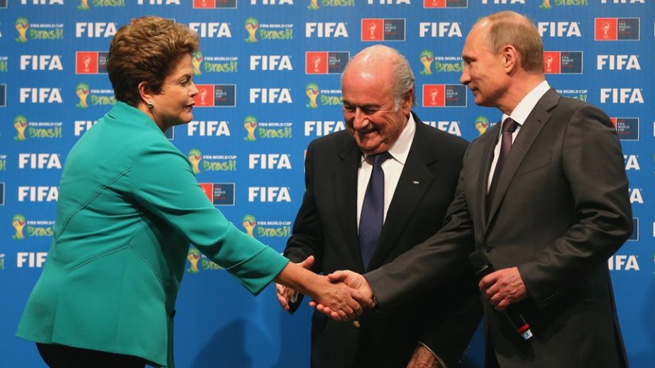 FIFA President Joseph S Blatter attends with Brazilian President Dilma Rousseff and Russian President Vladimir Putin the symbolic hand over of the FIFA World Cup from Brazil to Russia ahead of the 2014 FIFA World Cup Brazil final match between Germany and