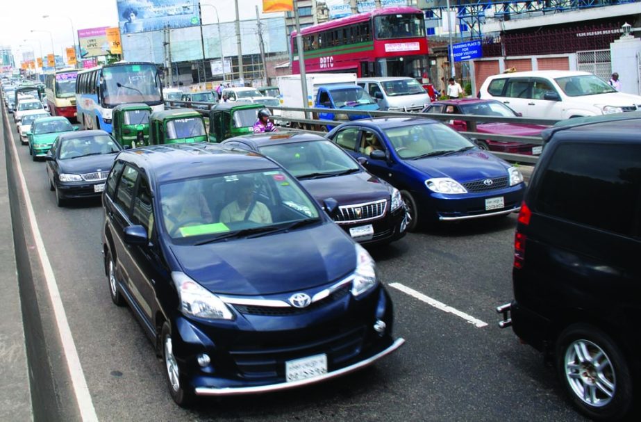 Motorised vehicles come to standstill due to heavy traffic snarl but the authorities remain indifferent to mitigate the woes of the road users. The snap was taken from the city's Mahakhali on Tuesday.