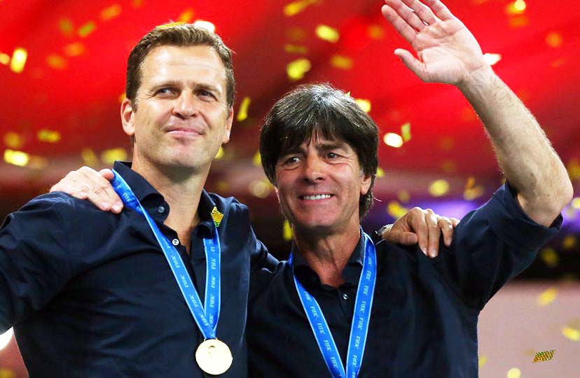 Head coach Joachim Loew (R) celebrates winning the World Cup with team manager Oliver Bierhoff after the 2014 FIFA World Cup Brazil final match between Germany and Argentina at Maracana in Rio de Janeiro, Brazil on Sunday.