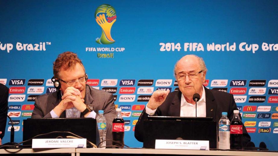 FIFA President Joseph S. Blatter (R) and Secretary General Jerome Valcke talk during a press conference at the Maracana Stadium in Rio de Janeiro Brazil on Monday.