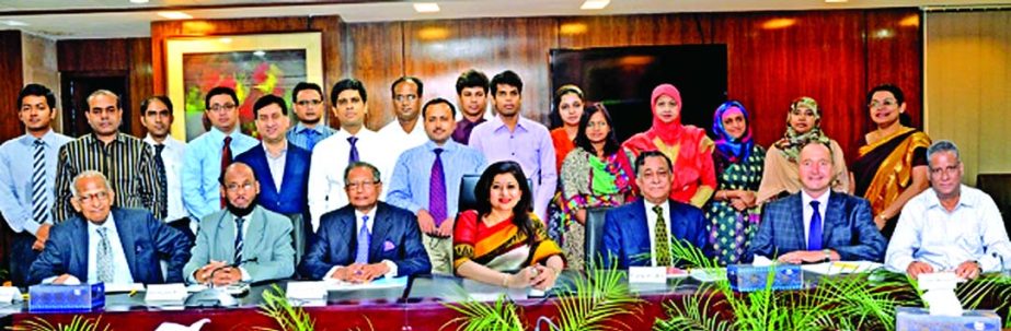 Nasir A Choudhury, Chairman of Professional Advancement Bangladesh Limited, a subsidiary of Green Delta Insurance Company Limited, poses with the participants of a workshop 'Train the Trainers' at its auditorium recently. Paul Archer, Trainer of Charter