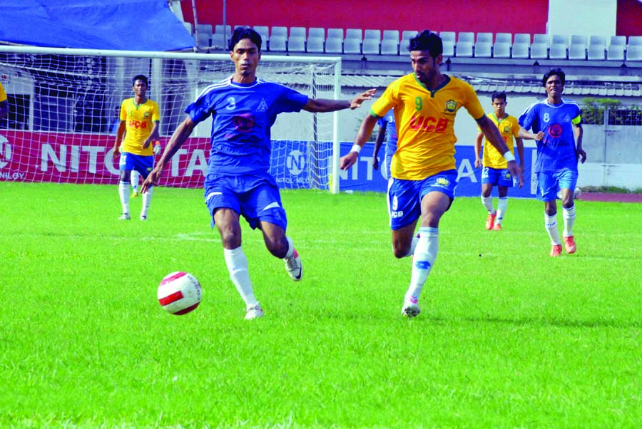 A moment of the match of the Nitol Tata Bangladesh Premier Football League between Sheikh Jamal Dhanmondi Club and Uttar Baridhara Club at the Bangabandhu National Stadium on Sunday. Sheikh Jamal Dhanmondi Club won the match 6-0.