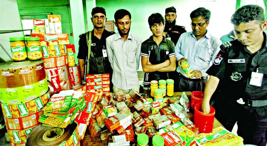RAB-1 mobile team led by a magistrate raided the Khan Food & Chemical Company on Sunday, arrested three employees and fined the company Taka three lakh for producing adulterated and substandard soft drink powder under foreign brand name and later sealed o