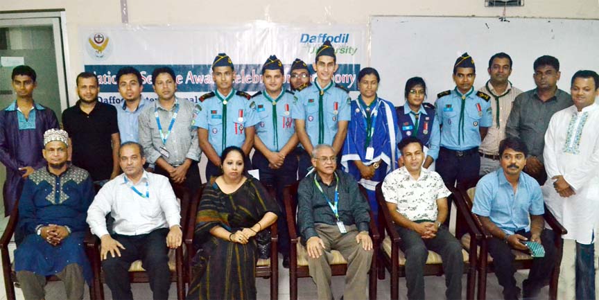 Former Deputy National Commissioner (Program) of Bangladesh Scout Md Arifuzzaman Arif, PRS and Prof Dr M. Lutfar Rahman, Vice Chancellor and President of DIU Air Rover Scout Group along with distinguished guests and winners of National Service Award are i