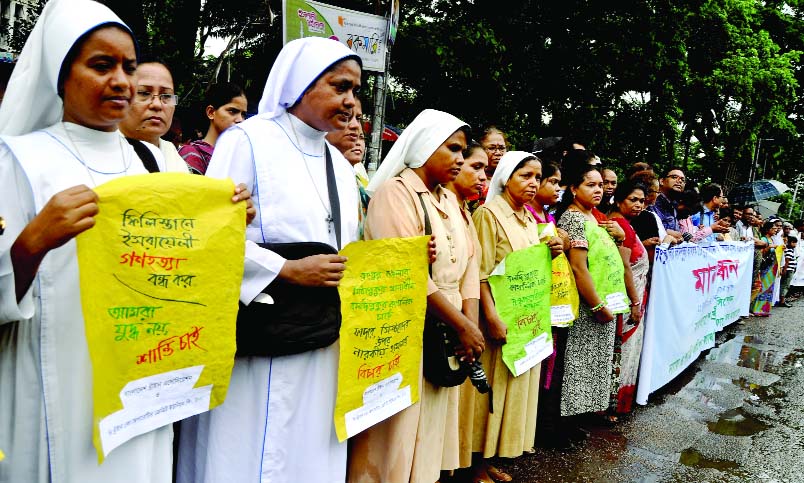 Bangladesh Christian Association and other organisations formed a human chain on Monday in front of Jatiya Press Club protesting the mass killings of Palestinians by Israel in Gaza.