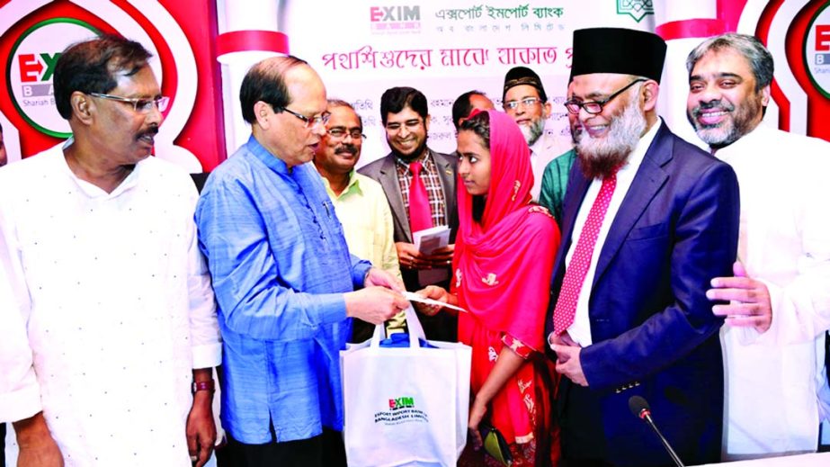 Bangladesh Bank Governor Dr Atiur Rahman, inaugurating Zakat distribution programme of EXIM Bank at Gulshan in the city on Monday. Md Nazrul Islam Mazumder, Chairman of the bank presided.