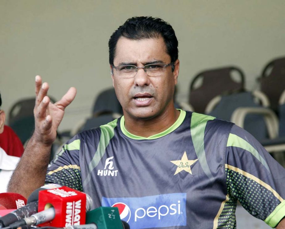 Waqar Younis talks to the press at Pakistan's training camp in Lahore on Monday.