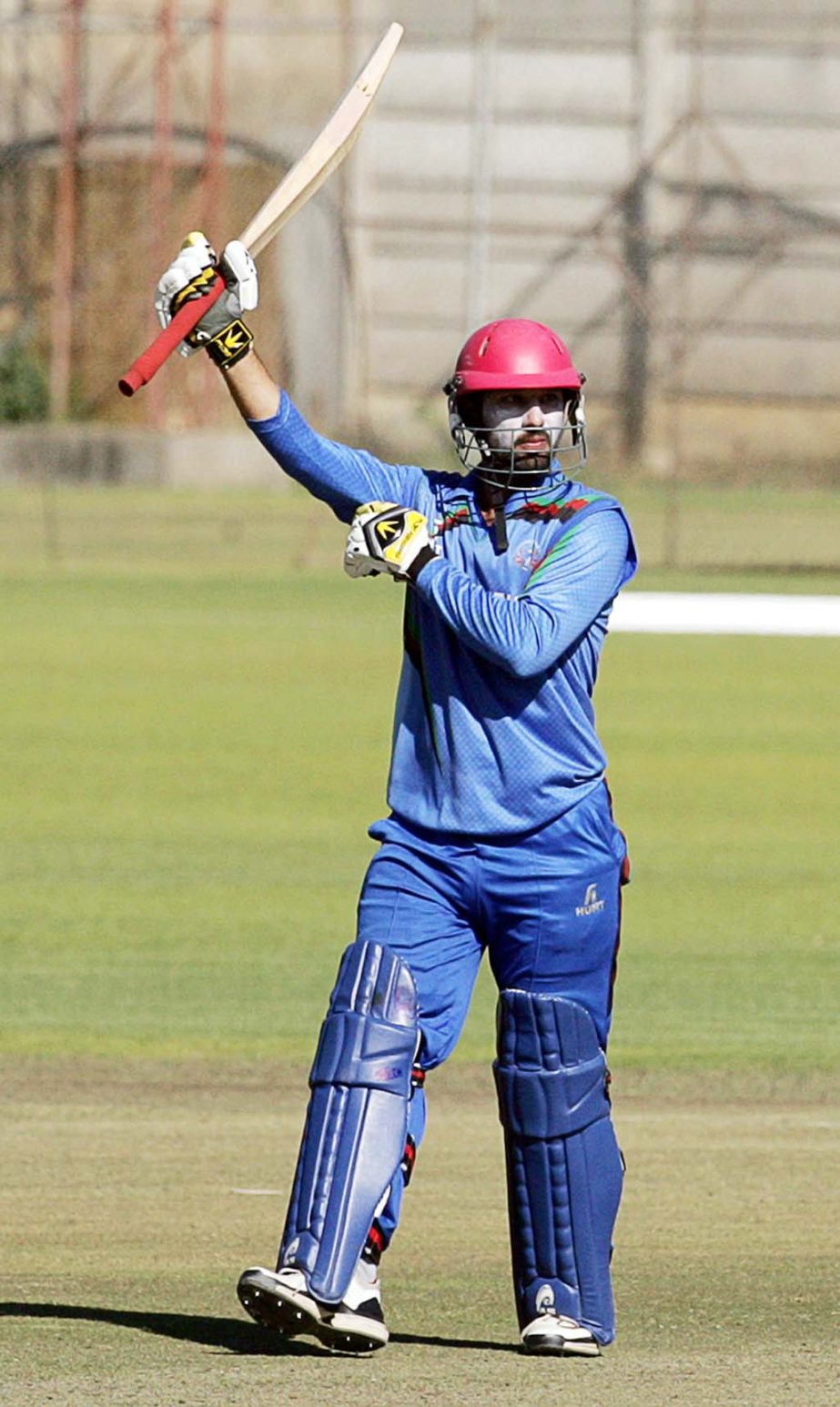 Javed Ahmadi celebrates his half-century in the 3rd ODI between Zimbabwe and Afghanistan at Bulawayo on Tuesday.