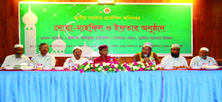 Monzur Hossain, Senior Secretary of Local Government Division, inaugurating iftar mahfil at its head office in the city on Wednesday. LGED Chief Engineer Md Wahidur Rahman presided.