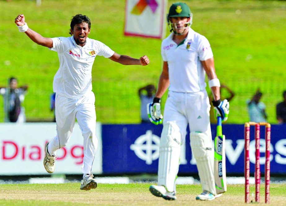 Suranga Lakmal exults after getting Faf du Plessis on the 2nd day of 2nd Test between Sri Lanka and South Africa in Colombo on Friday.