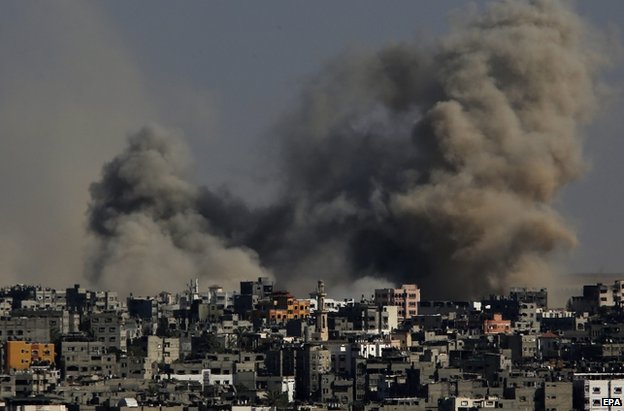 Smoke over the Gaza Strip after Israeli air strikes on Friday