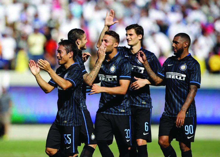 Yuto Nagatomo (55) of FC Internazionale celebrates after they beat Real Madrid in a penalty shootout during the International Champions Cup 2014 at California Memorial Stadium in Berkeley, California on Saturday.