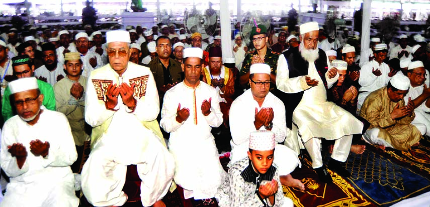 President Abdul Hamid along with other distinguished persons offering Eid-ul-Fitr prayers at the National Eidgah Maidan in the city on Tuesday.