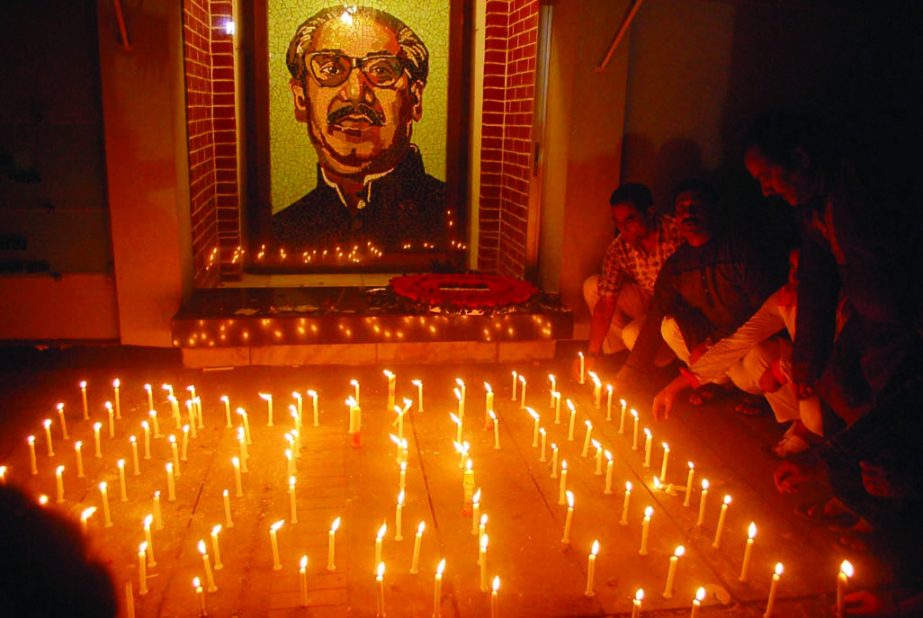 Different associate organisations of Bangladesh Awami League observe the first day of Month of Mourning by lighting candles at the portrait of Bangabandhu Sheikh Mujibur Rahman at 32 No Dhanmondi in the city on Friday.