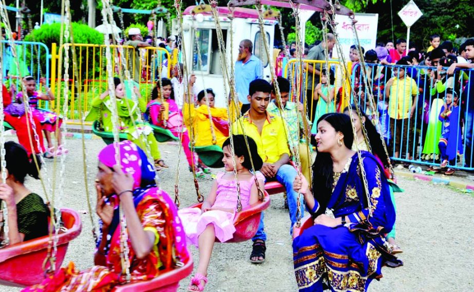 Children making merriments at Shishu Park in the city on Friday (Fourth day of the Eid-ul-Fitr).