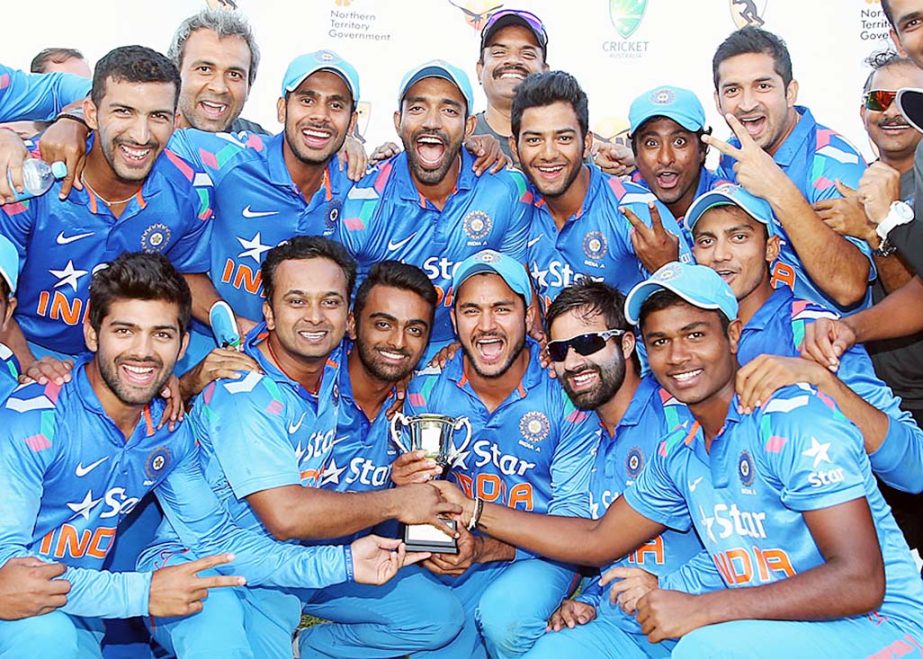 The victorious India A team celebrate with the quadrangular series trophy of Quadrangular A-Team One-day series at Darwin on Saturday.