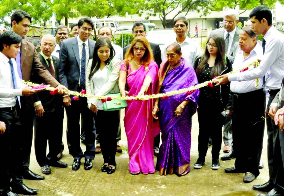 Nasim Haque, Chairperson of Sikder Insurance Company Limited, inaugurating corporate office of the company at West Dhanmondi in the city recently.