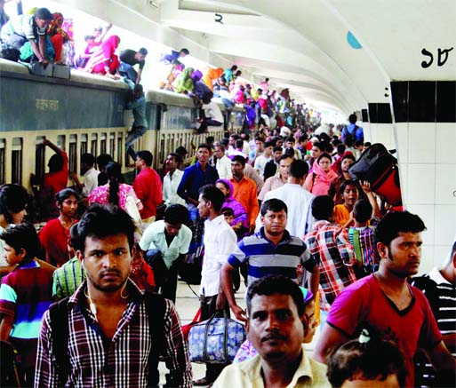 Kamalapur Railway Station being overcrowded as people started to return to city homes after celebrating Eid festival with their near and dear ones. This photo was taken on Saturday.