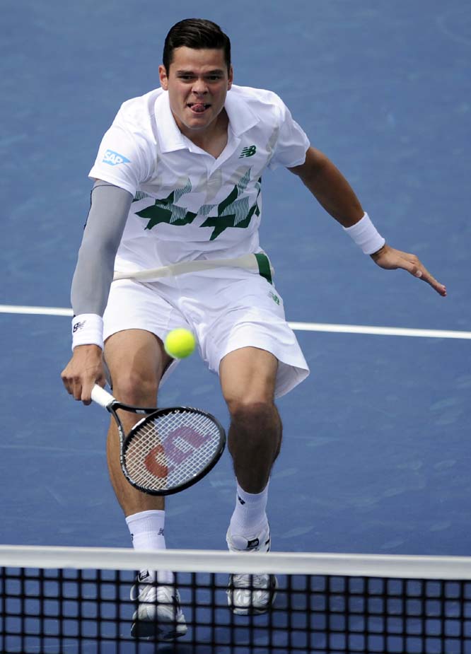 Milos Raonic, of Canada, returns the ball against Donald Young during a match at the Citi Open tennis tournament in Washington on Saturday. Raonic won the match 6-4, 7-5.