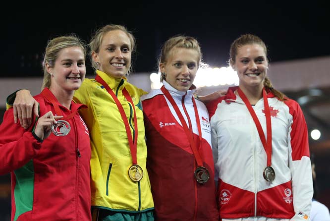 Alana Boyd (second left) of Australia with her gold medal for winning the women's pole vault, with Sally Peake (left) of Wales who won silver and Alysha Newman (right) of Canada who won a bronze and Sally Scott of England who also won a bronze medal at
