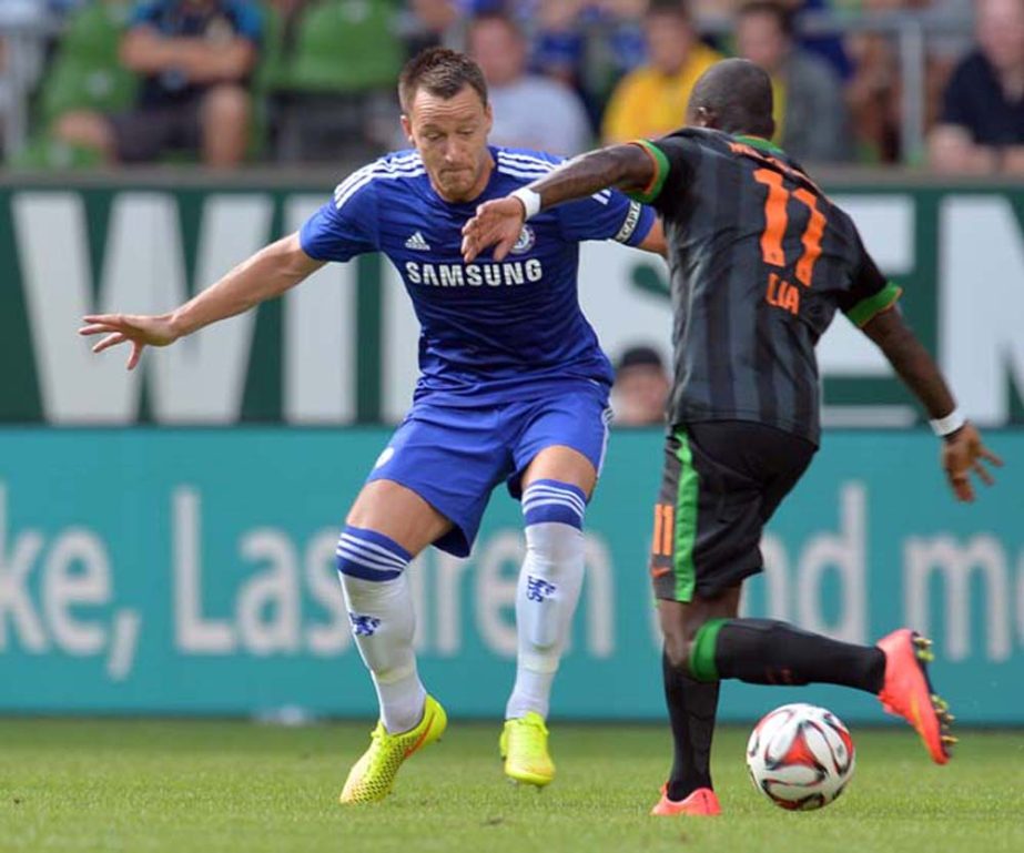 Bremen's Eljero Elia (right) and Chelsea's John Terry challenge for the ball during the preseason soccer match between SV Weder Bremen of Germany, and England's FC Chelsea in Bremen, northern Germany on Sunday.