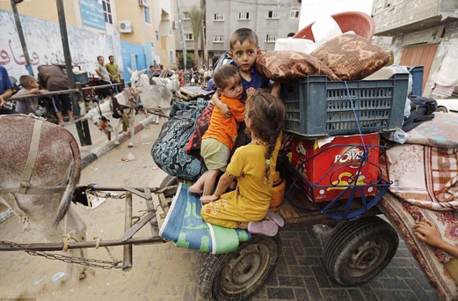 Painful road back home: Displaced Palestinians leave a United Nations school in Beit Lahia in the northern Gaza Strip to return to their houses after a 72-hour ceasefire between Israel and Hamas took effect.