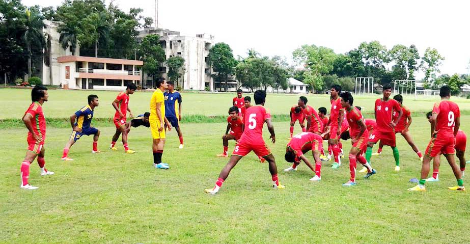 Players of Under-23 Football team during a practice session at the Bangladesh Krira Shikkha Protishthan (BKSP) on Tuesday.