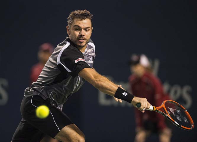 Stan Wawrinka of Switzerland returns the ball to Benoit Paire of France during the Rogers Cup men's tennis tournament in Toronto on Tuesday.