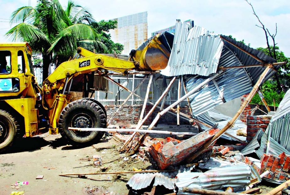 Biman authorities led by a magistrate demolished the illegal structures constructed on the Civil Aviation land at Uttara by the grabbers on Wednesday.