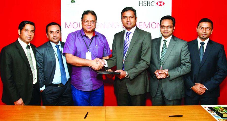 Tony Khan, General Manager of Grand Sultan Tea Resort and Golf and Sabbir Ahmed, Head of Retail Banking and Wealth Management of Hongkong and Shanghai Banking Corporation Limited, Bangladesh sign a deal to facilitate HSBC customers 50percent off for room