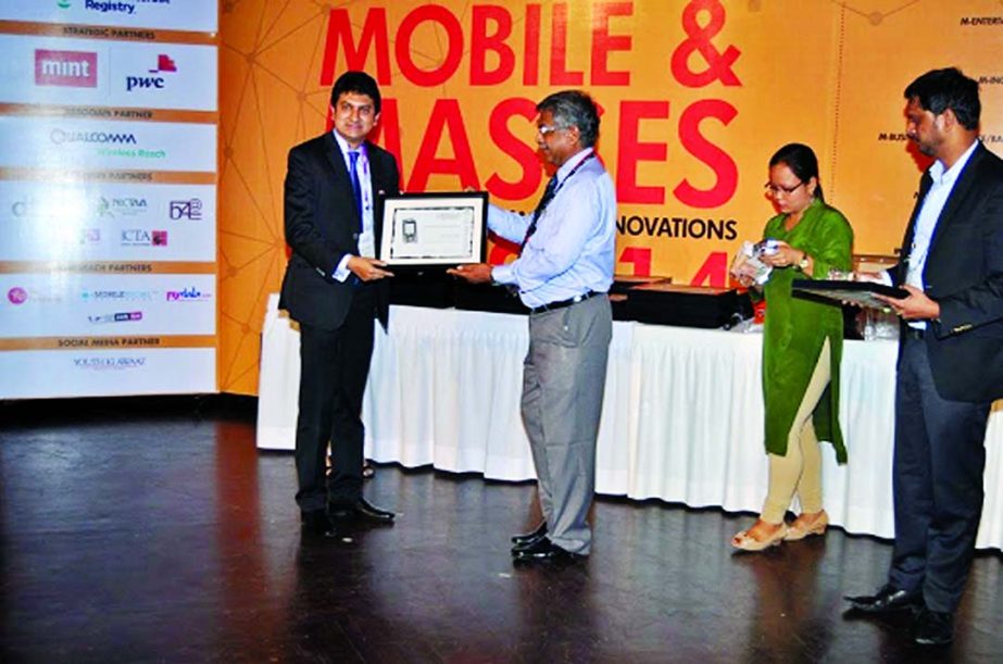 Mridul Chowdhury, CEO of mPower Social Enterprises Ltd, receiving 'mBillionth award 2014' in mAgriculture Category for 'Farmer Query System', a mobile-based agro advisory service developed, in India recently.