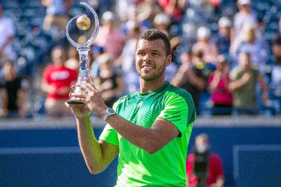 Jo-Wilfried Tsonga holds the Rogers Cup after defeating Roger Federer of Switzerland 7-5, 7-6 in the final at Rexall Centre in Toronto, Ontario on Sunday.