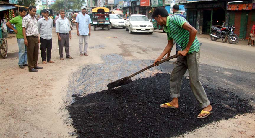 Road repairing work is going on at Lovelane road in Chittagong city. This picture was taken yesterday.