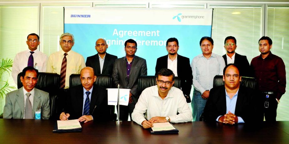 Hafizur Rahman Khan, Chairman of Runner Group and Vivek Sood, CEO of Grameenphone sign a Business Solutions deal on Tuesday.