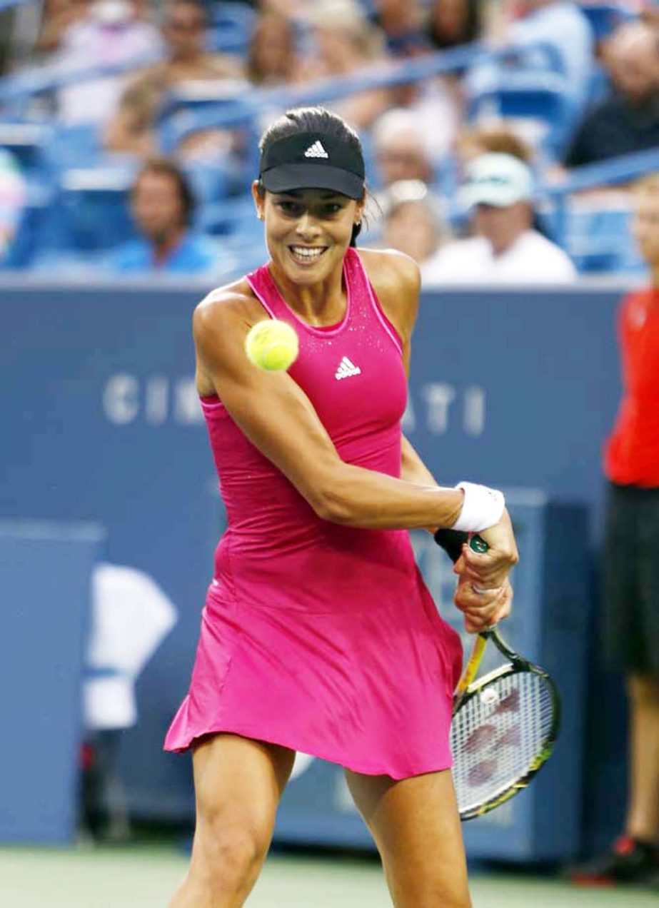 Ana Ivanovic from Serbia returns a volley from Sorana Cirstea from Romania in a first round match at the Western & Southern Open tennis tournament in Mason, Ohio on Monday. Ivanovic won 6-1, 7-5.