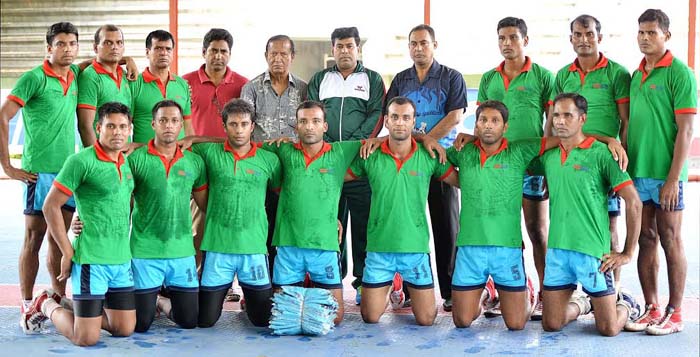 Bangladesh Kabaddi team with Additional Director of Walton FM Iqbal Bin Anwar Dawn pose for a photo session at the Kabaddi Stadium on Tuesday.