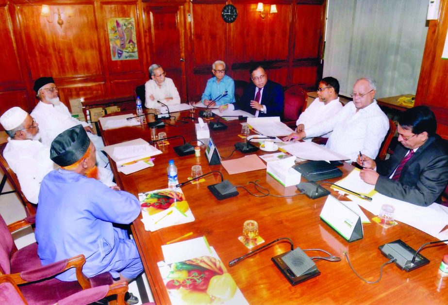 M Azizul Huq, Chairman of Pubali Bank Shariah Supervisory Committee presiding over the 14th Shariah meeting at its head office recently. Helal Ahmed Chowdhury, Managing Director of the bank and Islamic Economist Prof M Muzahidul Islam were present.