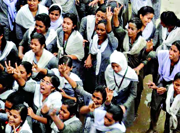Students of Abdul Kadir Mollah City College in Narsingdi celebrating their success for obtaining second position in the HSC examination under Dhaka Board this year.