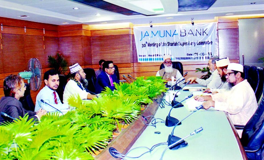 Professor Mawlana Md Salahuddin, Chairman of Shariah Supervisory Committee of Jamuna Bank Limited presiding over the 30th Shariah meeting at its head office recently. Shafiqul Alam, Managing Director & CEO of the bank was present.