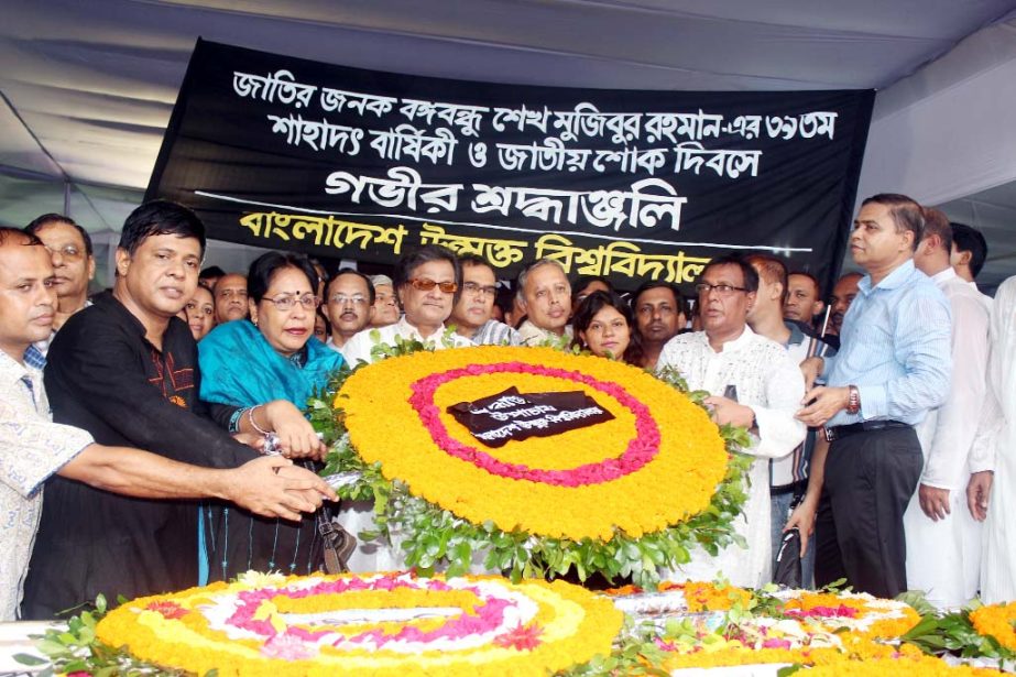 Vice-Chancellor of Bangladesh Open University, Prof Dr MA Mannan along with the Pro-Vice Chancellor, Treasurer and the Teachers, Officers, Employee of the University is placing of floral wreath paying tributes at the portrait of father of the Nation Banga