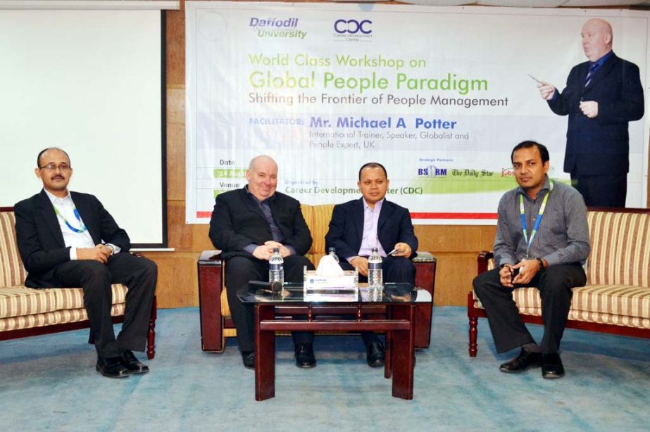 International management trainer Michael A Potter and Md Sabur Khan, Chairman Board of Trustees are seen on the podium at the workshop on â€œGlobal People Paradigm - Shifting the Frontier of People Managementâ€ organized by Daffodil International