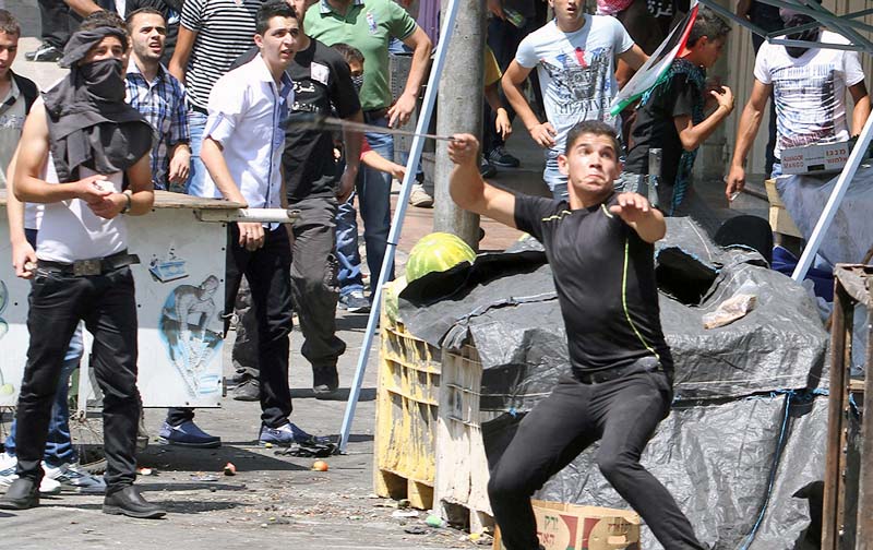 Palestinians on the West Bank hurled stones at the Israeli soldiers after shots across the border' despite a ceasefire.