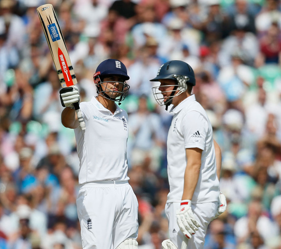 Alastair Cook signals his half-century on the second day of 5th Investec Test between England and India at the Oval on Saturday.