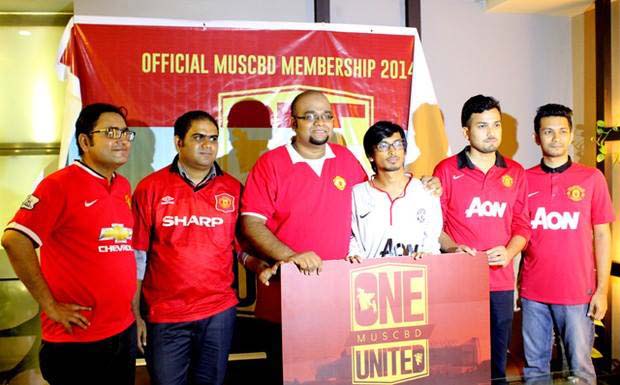 Manchester United Supporters Club Bangladesh (MUSCBD), the official supporters club of Manchester United Football Club in Bangladesh pose with the One United Membership Card of MUSCBD at Gulshan in the city on Saturday.