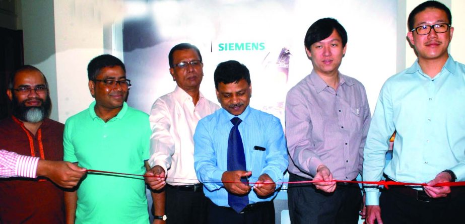 Prof Dr Zillur Rahman, Director of United Hospital inaugurating new outlet of Siemens hearing technology "Hearing Care Clinic" at Gulshan in the city on Monday. TrenceKoh, Country Manager of Siemens Asia Pacific Zone and WeslehShu, Chief Audiologist of